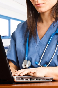 Nurse Typing at a Laptop Computer