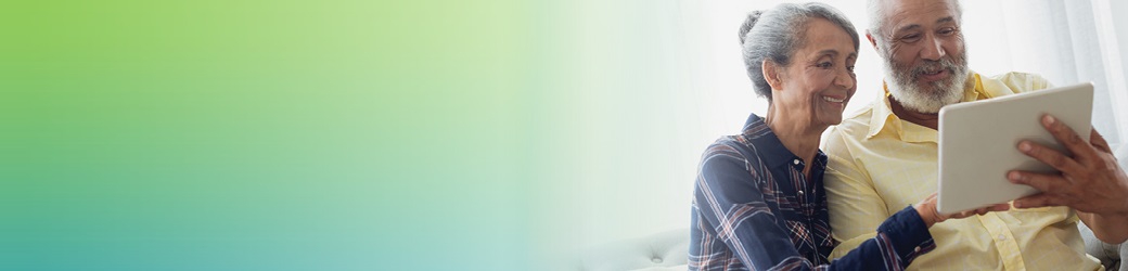 Senior Man and Woman Using Tablet